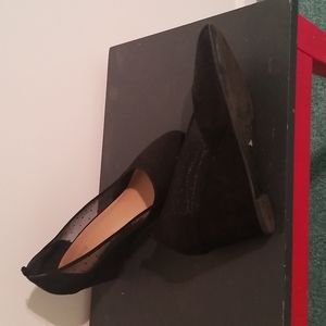 Black wedge slip ons